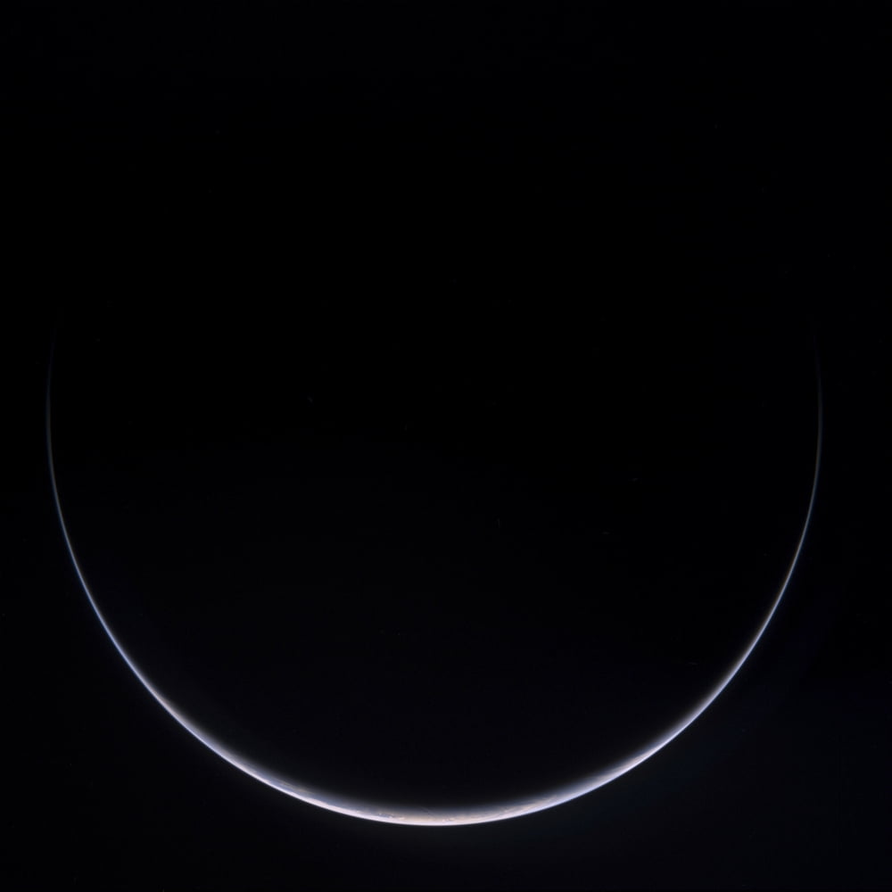 A sun-illuminated crescent of Earth around Antarctica Canvas Art - Stocktrek Images (28 x 28)