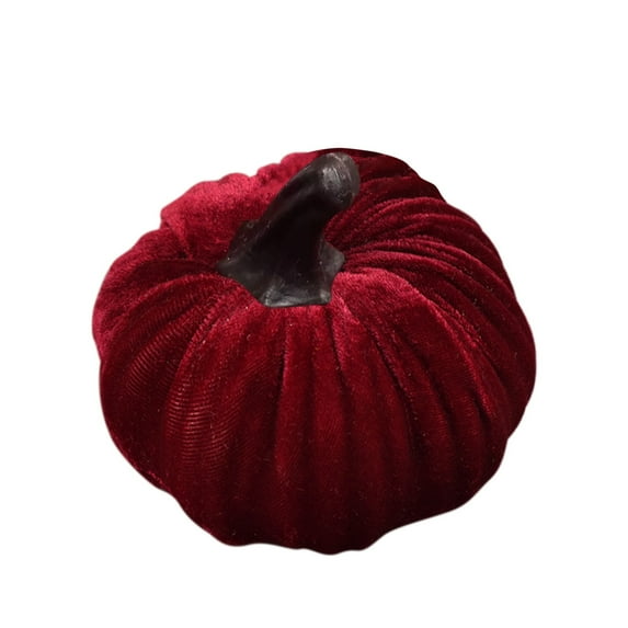 A super soft velvet pumpkin ornament, exquisitely filled with intricate details