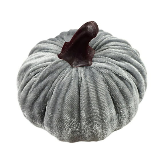 A super soft velvet pumpkin ornament, exquisitely filled with intricate details