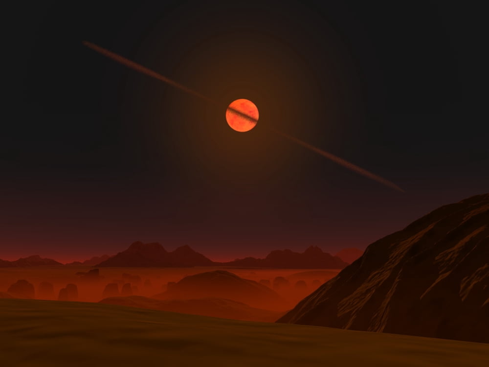A view across a hypothetical primitive alien planet towards a brown dwarf in the sky Canvas Art - Walter MyersStocktrek Images (17 x 13)
