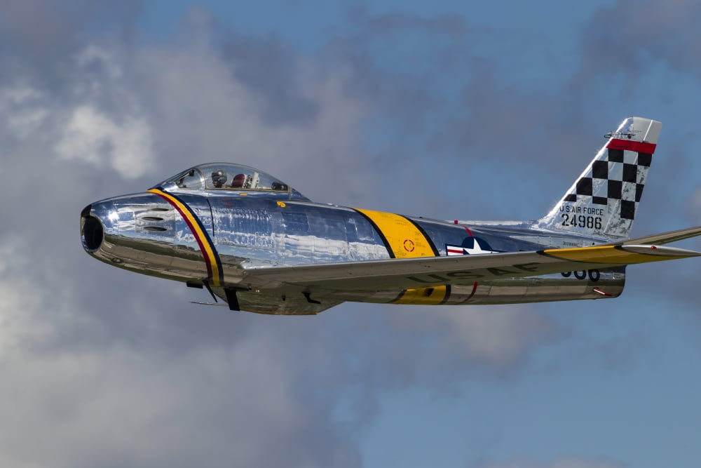 A vintage F-86 Sabre of the Warbird Heritage Foundation Canvas Art - Rob EdgcumbeStocktrek Images (17 x 12)