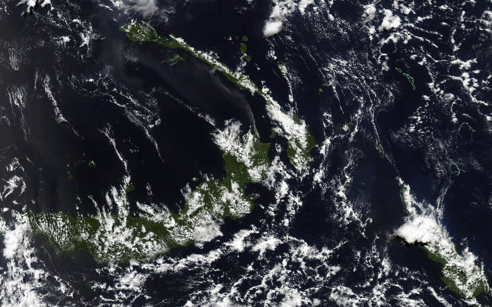 A volcanic plume from the Rabaul caldera blows along the island of New Ireland Canvas Art - Stocktrek Images (36 x 22)