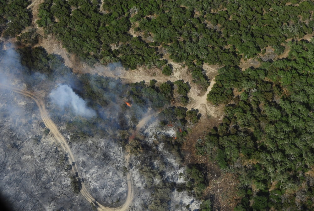 A wildfire burns land near Austin Texas Canvas Art - Stocktrek Images (34 x 23)