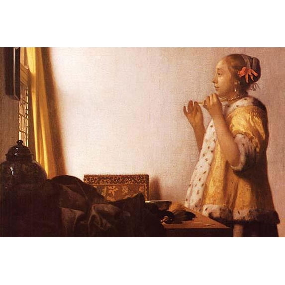 A young girls tries on a Pearl necklace Poster Print by Johannes Vermeer (18 x 24)