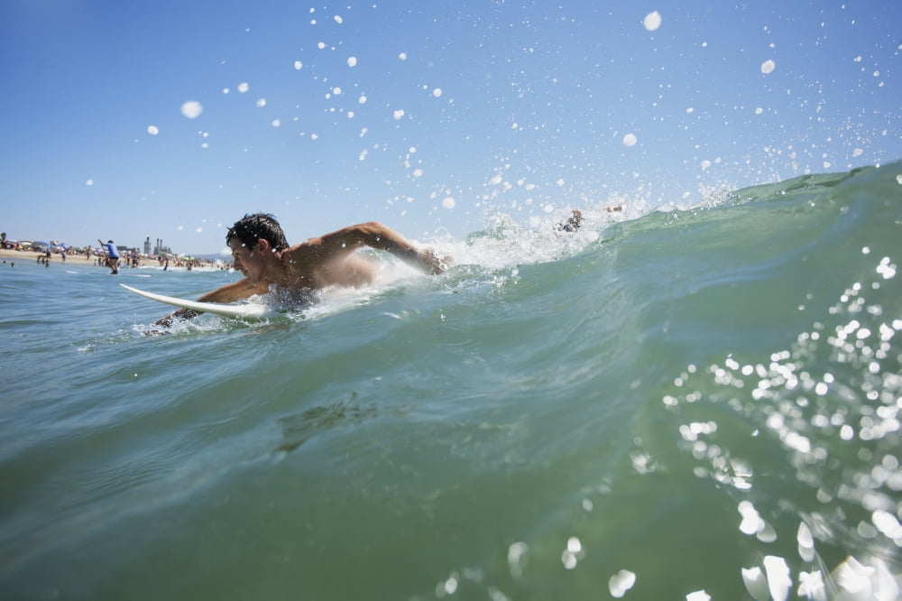 A young man on a surfboard Hawaii United States of America Canvas Art - Mike Raabe Design Pics (38 x 24)