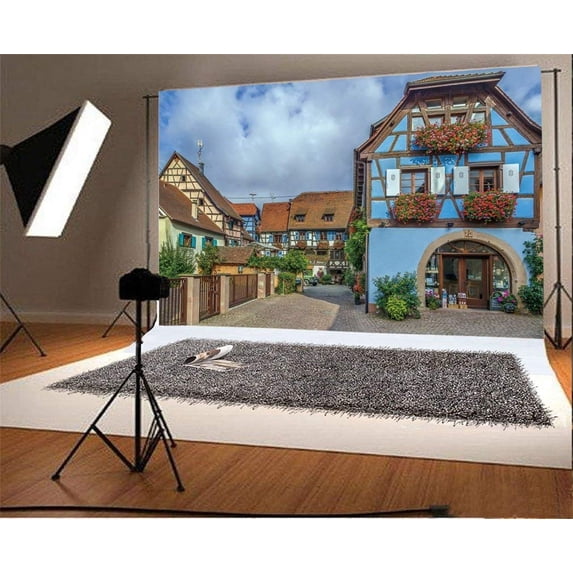 ABPHOTO 7x5t Photography Backdrop Floral France Street in Eguisheim Alsace Hot Pink Flowers European Green Plants Blue Sky White Cloud Travel Photo Background Backdrops