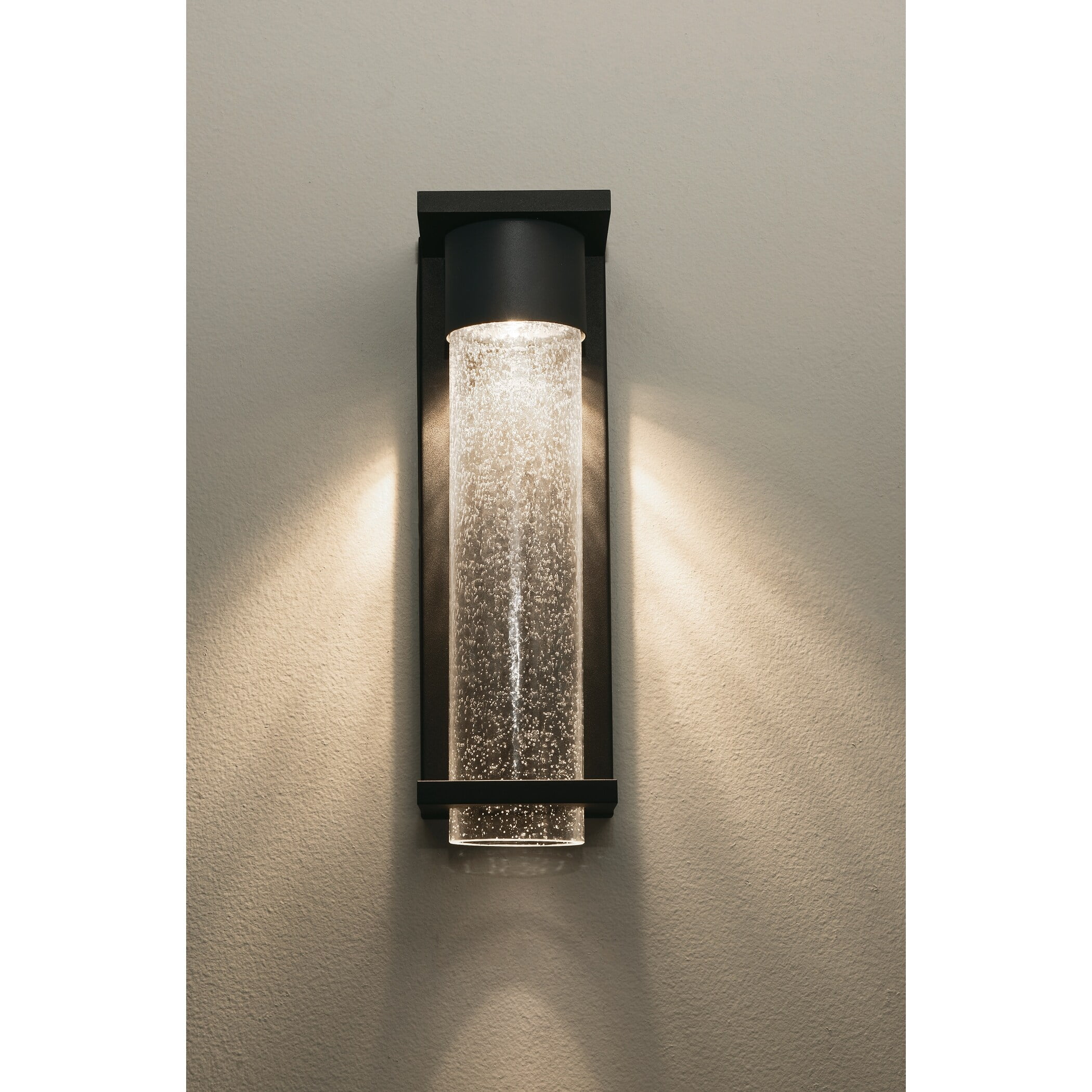 Dimmable Black Metal Cylinder Sconce with Seeded Glass Shade
