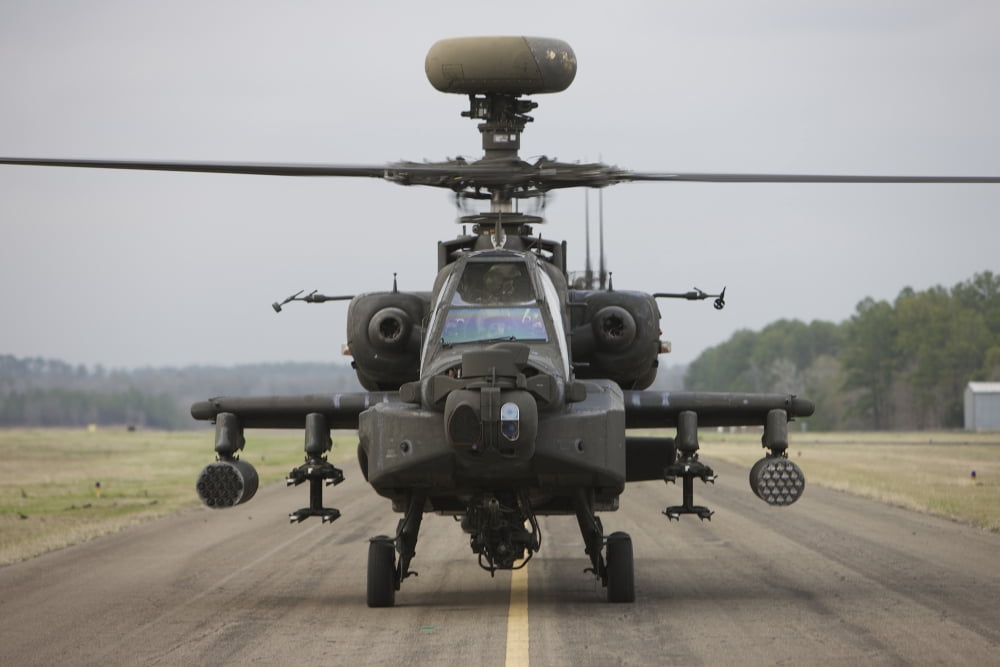 AH-64 Apache helicopter on the runway Canvas Art - Terry MooreStocktrek Images (35 x 23)