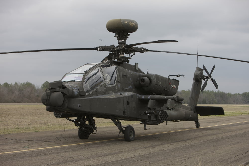 AH-64 Apache helicopter on the runway Canvas Art - Terry MooreStocktrek Images (35 x 23)