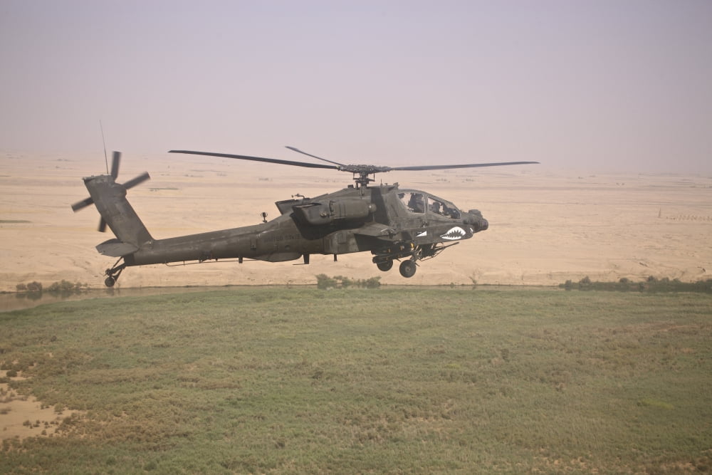 AH-64D Apache helicopter on a mission over Northern Iraq Canvas Art - Terry MooreStocktrek Images (35 x 23)