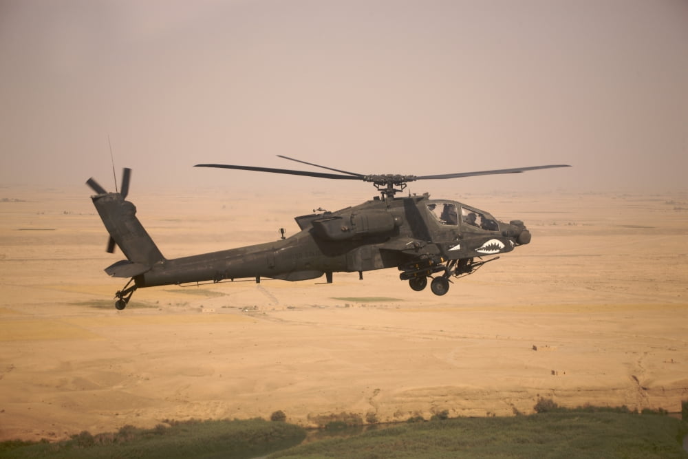 AH-64D Apache helicopter on a mission over Northern Iraq Canvas Art - Terry MooreStocktrek Images (35 x 23)