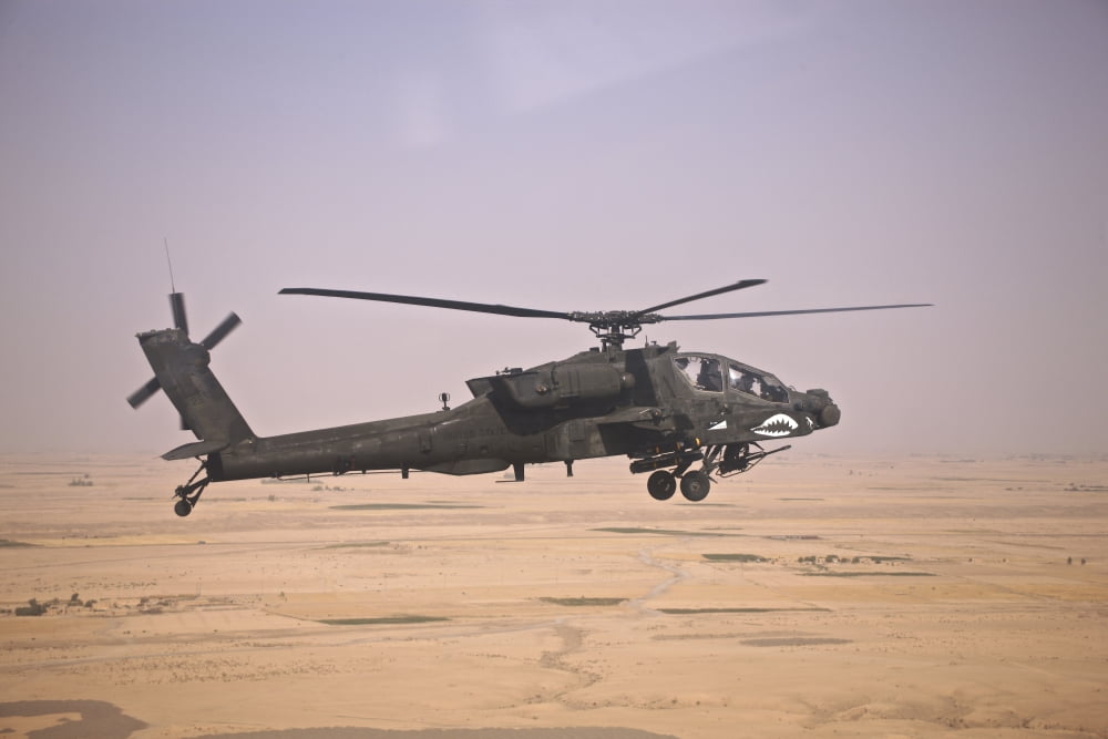AH-64D Apache helicopter on a mission over Northern Iraq Canvas Art - Terry MooreStocktrek Images (35 x 23)