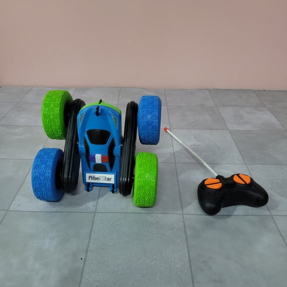 AIBEI STAR Battery operated action toys, 360 Rotating Double-Sided RC Flip Toy Car