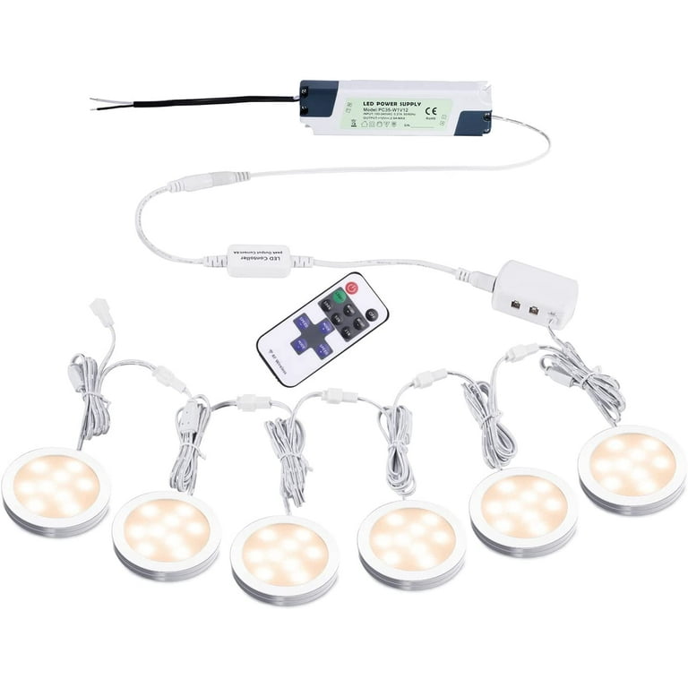Wired puck outlet lights with remote