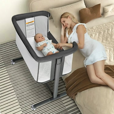 Delta Children Soothing Baby Rocking Bassinet with Storage, Playtime ...