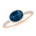 thumbnail image 1 of ANGARA Natural Oval 1.5 ct London Blue Topaz and Diamond Ring in 14K Rose Gold for Women (Size-8x6mm) | November Birthstone, Anniversary, Jewelry Gift for Women | Natural London Blue Topaz Ring, 1 of 10