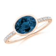 thumbnail image 1 of ANGARA Natural Oval 1.5 ct London Blue Topaz and Diamond Ring in 14K Rose Gold for Women (Size-8x6mm) | November Birthstone, Anniversary, Jewelry Gift for Women | Natural London Blue Topaz Ring, 1 of 10