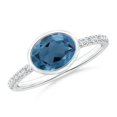 thumbnail image 1 of ANGARA Natural Bezel-Set Oval 1.5 ct London Blue Topaz and Diamond Ring in 14K White Gold for Women (Size-8x6mm) | November Birthstone Jewelry for Women | London Blue Topaz Ring (Ring Size- 11), 1 of 10