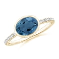 thumbnail image 1 of ANGARA Natural Bezel-Set Oval 1.5 ct London Blue Topaz and Diamond Ring in 14K Yellow Gold for Women (Size-8x6mm) | November Birthstone Jewelry for Women | London Blue Topaz Ring (Ring Size- 8), 1 of 10