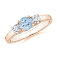thumbnail image 1 of ANGARA Natural Classic Round Aquamarine and Diamond Three Stone Ring in 14K Rose Gold for Women (Size-5mm) | March Birthstone, Birthday, Anniversary, Jewelry Gift for Women | Natural Aquamarine Ring, 1 of 7