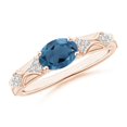 thumbnail image 1 of ANGARA Natural Oval 1.5 ct London Blue Topaz Vintage Style Ring with Diamond in 14K Rose Gold for Women (Size-8x6mm) | November Birthstone Jewelry for Women | London Blue Topaz Ring (Ring Size- 5), 1 of 11