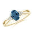 thumbnail image 1 of ANGARA Natural Oval London Blue Topaz Split Shank Ring with Trio Diamonds in 14K Yellow Gold for Women (Size-7x5mm) | November Birthstone Jewelry for Women | London Blue Topaz Ring (Ring Size - 6.5), 1 of 9