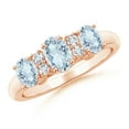 thumbnail image 1 of ANGARA Natural Oval Three Stone Aquamarine Engagement Ring with Diamonds in 14K Rose Gold for Women (Size-6x4mm) | March Birthstone, Anniversary, Jewelry Gift for Women | Natural Aquamarine Ring, 1 of 9