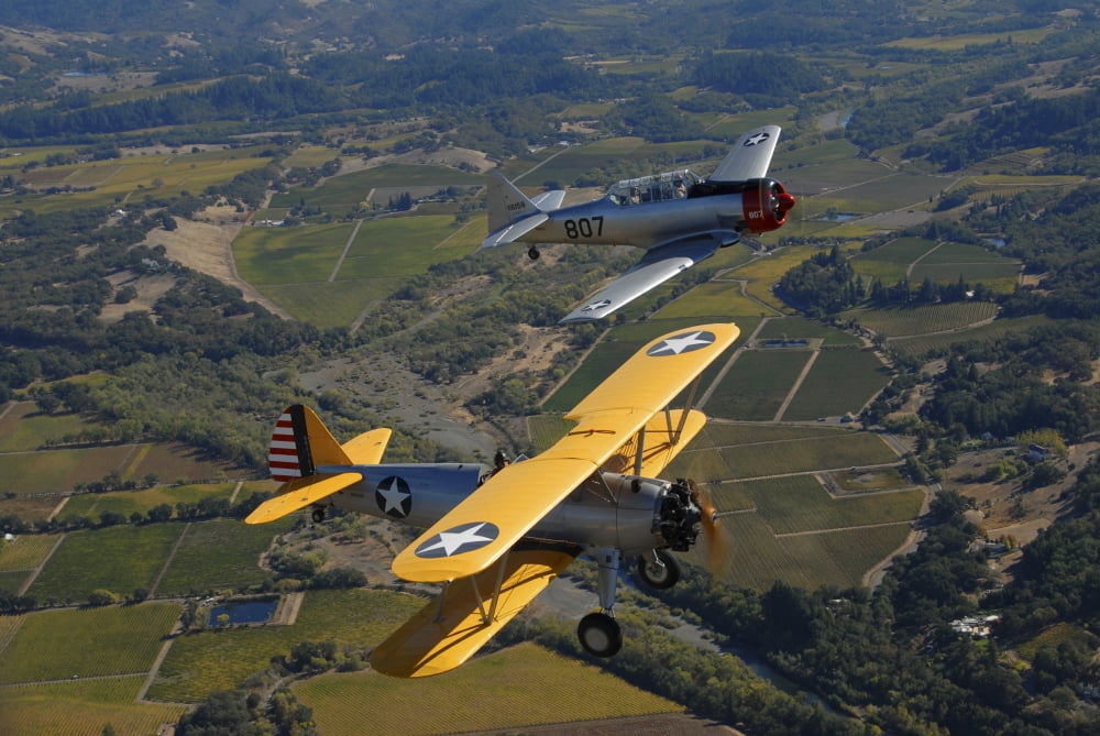 AT-6 Texan and Stearman PT-17 flying over Santa Rosa California Canvas Art - Phil WallickStocktrek Images (17 x 12)