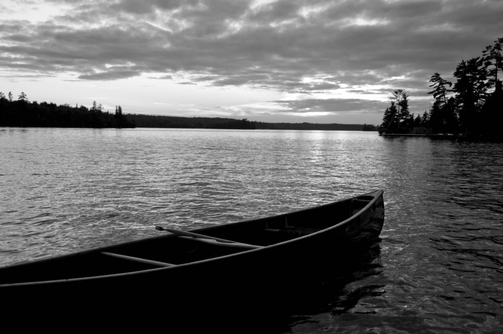 Abandoned Canoe Floating On Water Canvas Art - Keith Levit Design Pics (19 x 12)