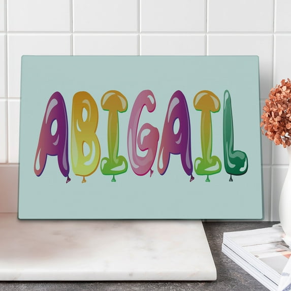 Abigail Cutting Board, Colorful Feminine Name Alphabet with Historical Roots Cartoon Lettering, Decorative Tempered Glass Cutting and Serving Board, Large Size, Multicolor, by Ambesonne