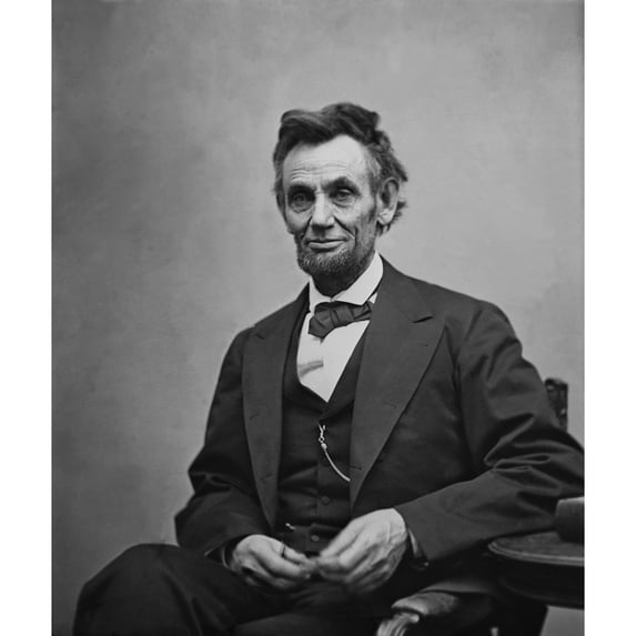 Abraham Lincoln Seated And Holding His Spectacles And A Pencil On Feb. 5 History (18 x 24)