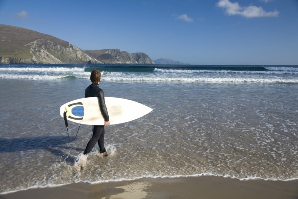 Achill Island Co Mayo Ireland Surfer Walking Along Trawmore Beach Canvas Art - Gareth McCormack Design Pics (36 x 24)