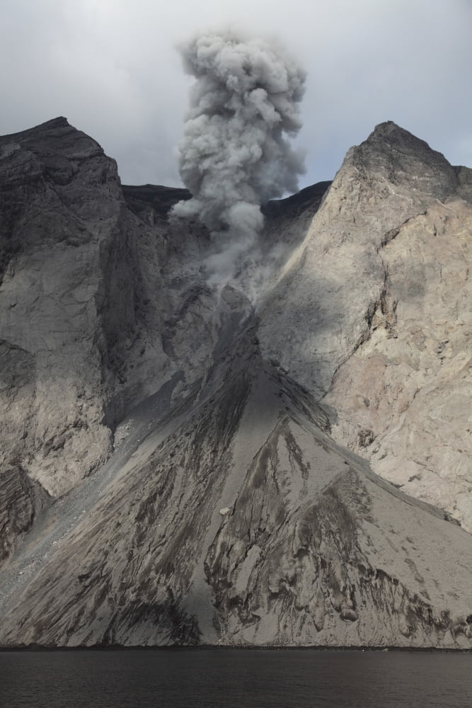 Active crater and debris slope below at Batu Tara volcano Indonesia Canvas Art - Richard RoscoeStocktrek Images (12 x 18)