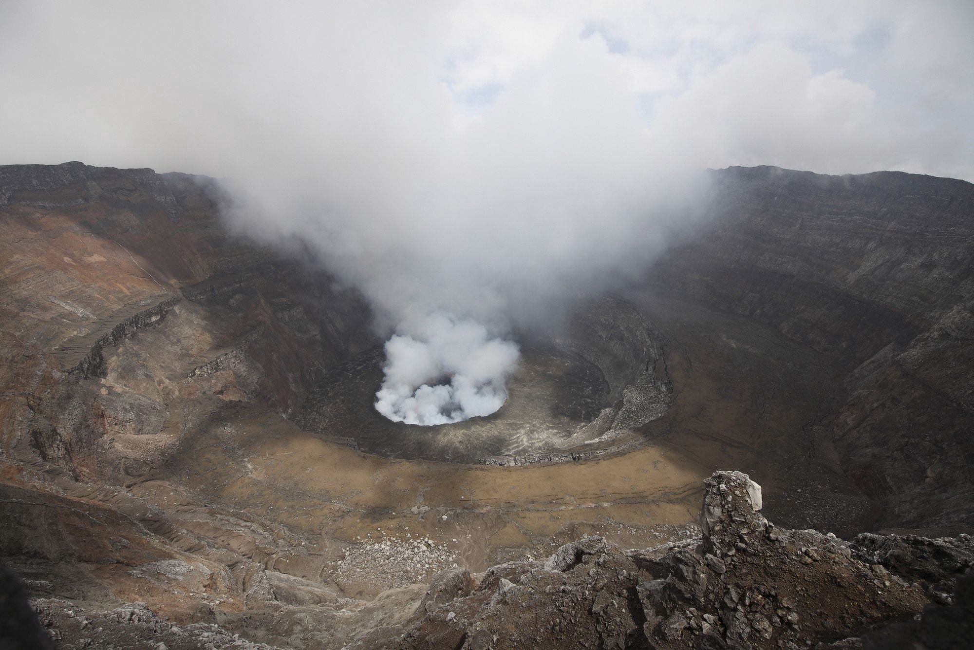 Active lava lake degassing in summit caldera Nyiragongo Volcano Democratic Republic of the Congo Canvas Art - Richard RoscoeStocktrek Images (35 x 23)