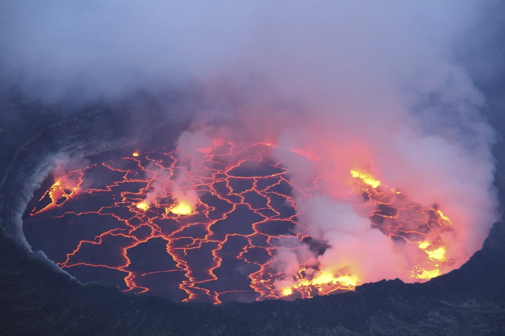 Active lava lake in pit crater Nyiragongo Volcano Democratic Republic of the Congo Canvas Art - Richard RoscoeStocktrek Images (35 x 23)