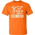thumbnail image 1 of Adult It's Not Easy Being My Wife's Arm Candy T-Shirt, 1 of 1