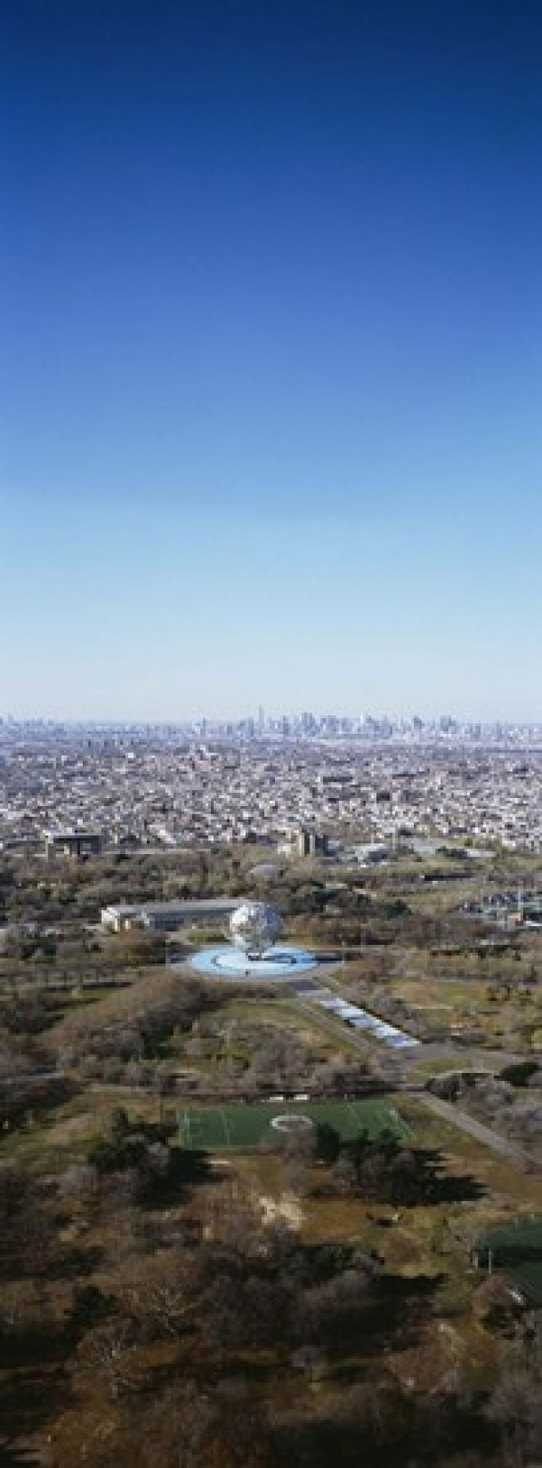 Aerial View Of Worlds Fair Globe From Queens Looking Towards Manhattan NYC New York City New York State USA Canvas Art - Panoramic Images (18 x 7)