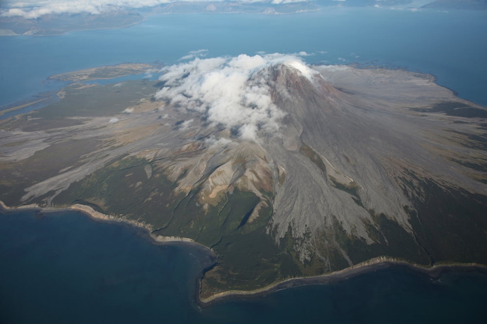 Aerial image of Mount St Augustine Volcano Cook Inlet Alaska Canvas Art - Richard RoscoeStocktrek Images (35 x 23)