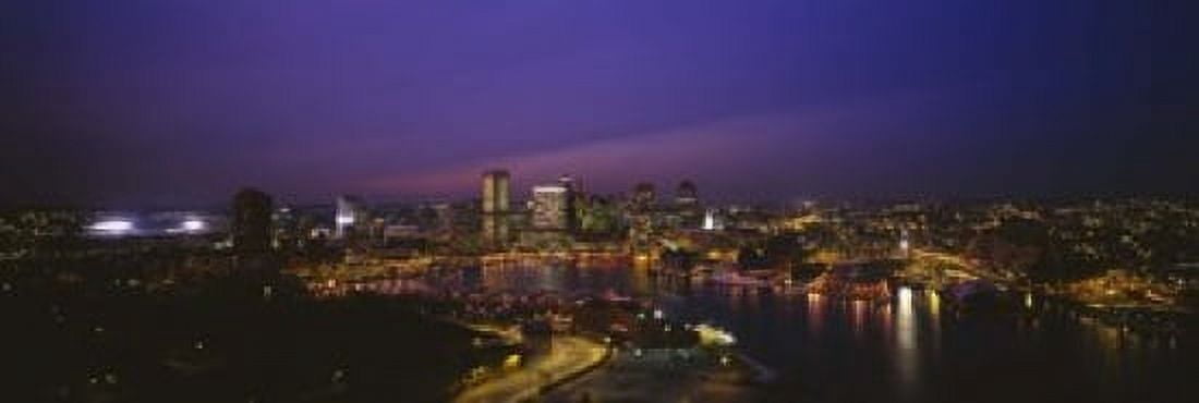 Aerial view of a city lit up at dusk Baltimore Maryland USA Canvas Art - Panoramic Images (18 x 6)
