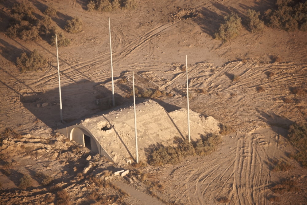Aerial view of a destroyed Iraqi ammunition magazine Canvas Art - Terry MooreStocktrek Images (18 x 12)