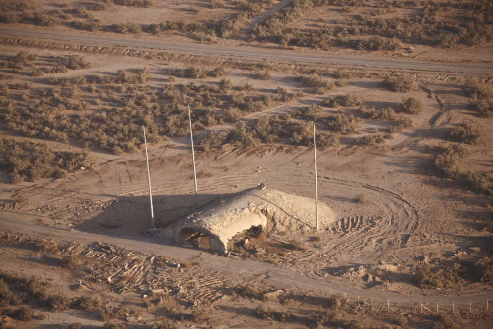 Aerial view of a destroyed Iraqi ammunition magazine Canvas Art - Terry MooreStocktrek Images (35 x 23)