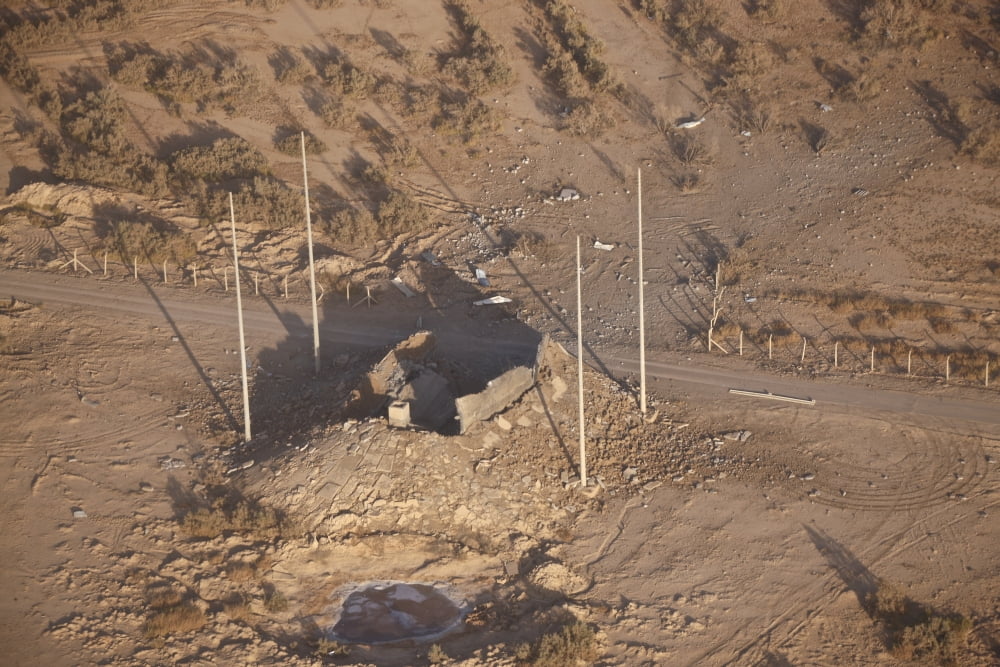 Aerial view of a destroyed Iraqi ammunition magazine Canvas Art - Terry MooreStocktrek Images (35 x 23)