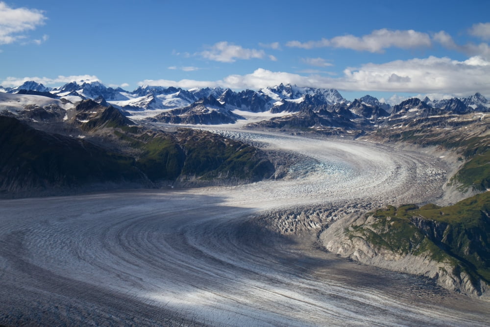 Aerial view of a meandering glacier within Lake Clark Pass Southcentral Alaska Canvas Art - Michael Criss Design Pics (19 x 12)