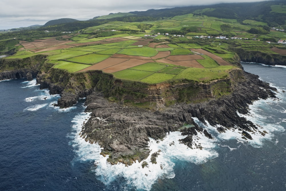 Aerial view of a rugged coastline and the patchwork pattern of farmland Ireland Canvas Art - Carl Bruemmer Design Pics (38 x 24)