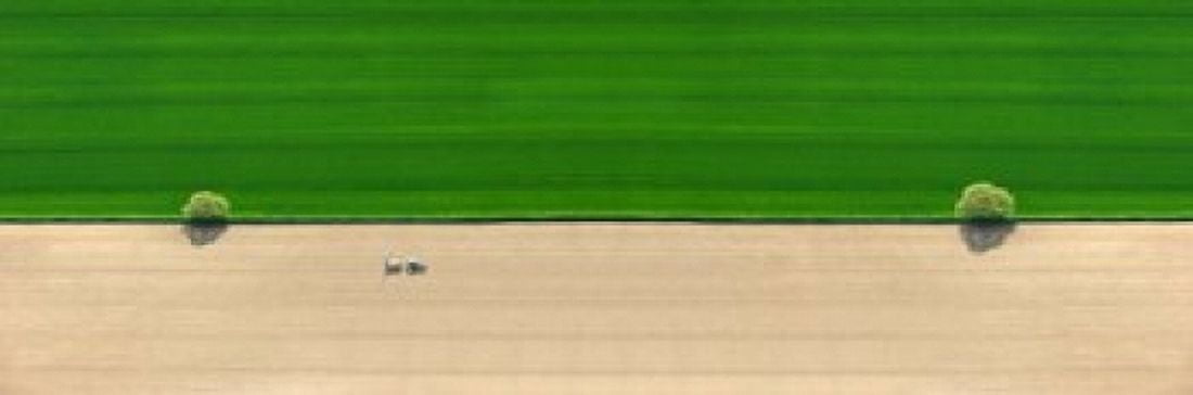 Aerial view of a tractor in field Canvas Art - Panoramic Images (18 x 6)