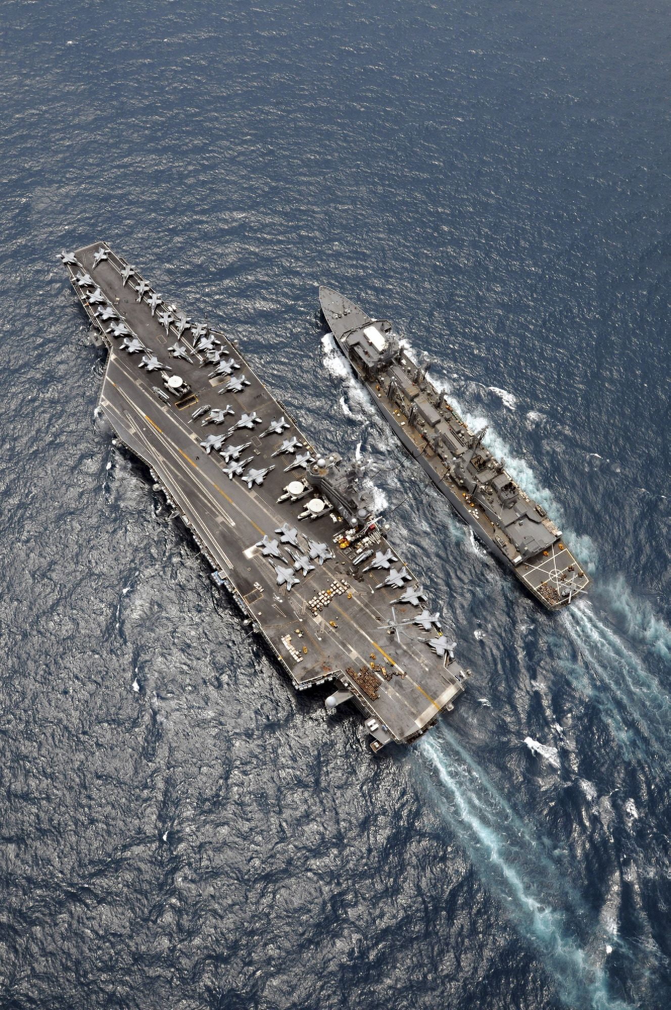 Aerial view of aircraft carrier USS Ronald Reagan and USNS Bridge during a replenishment at sea Canvas Art - Stocktrek Images (23 x 34)