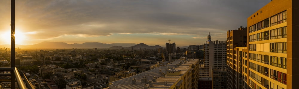 Aerial view of cityscape at sunset Santiago Chile Canvas Art - Panoramic Images (36 x 12)