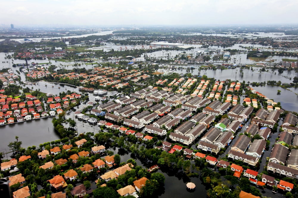 Aerial view of flood waters affecting an area of Thailand Canvas Art - Stocktrek Images (35 x 23)