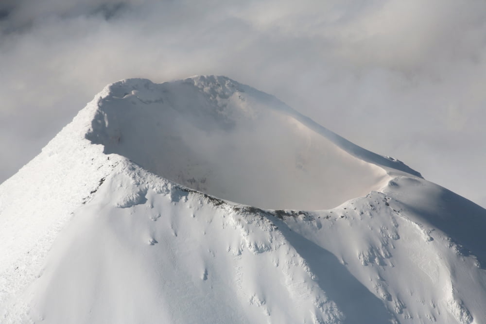 Aerial view of summit of Shishaldin Volcano Unimak Island Alaska Canvas Art - Richard RoscoeStocktrek Images (35 x 23)