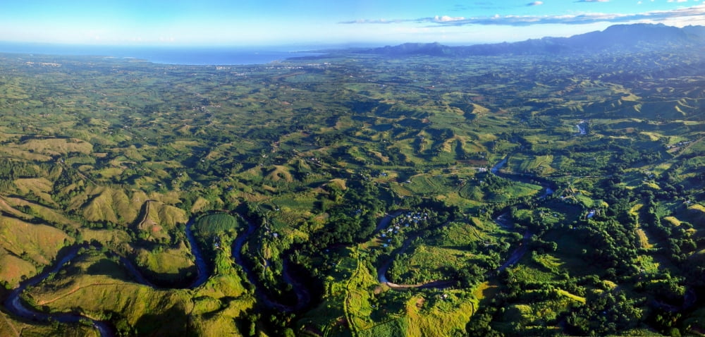 Aerial view of the Nadi River winding through the valley in Fiji Canvas Art - Michael WoodStocktrek Images (21 x 10)